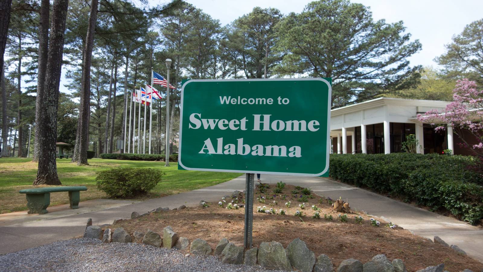 A Welcome to Alabama sign at a rest stop