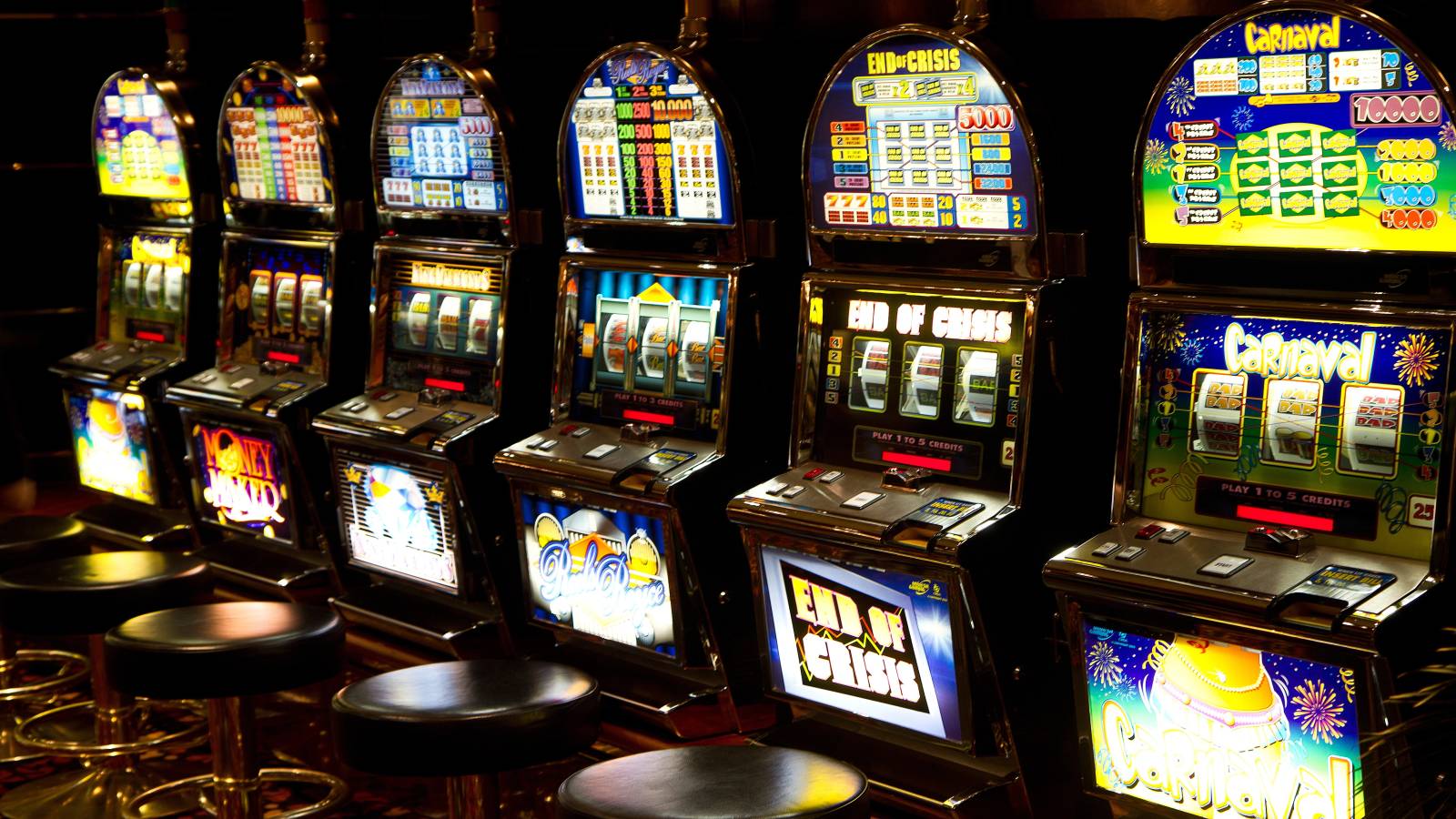 A row of slot machines in a casino