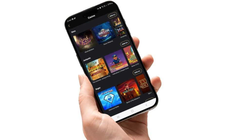 BetMGM casino Smartphone App, showing on an android phone, held in a ladies hand, isolated on white.