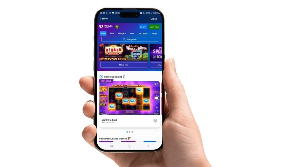 Fanduel Mobile Casino App on a smartphone mockup, held in a left hand.